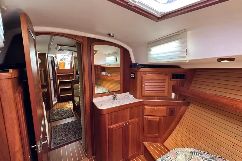 Slide: The Image of Interior of 2007 Sabre 386 yacht with wooden cabinetry and cozy design. - 71