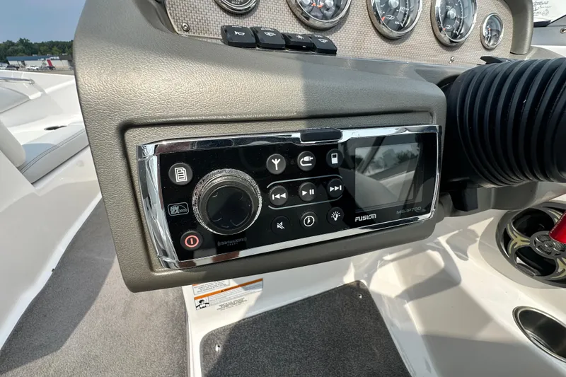 Slide: The Image of Dashboard of a 2013 Regal 1900 Bowrider boat with Fusion MS-IP700 stereo system. - 8