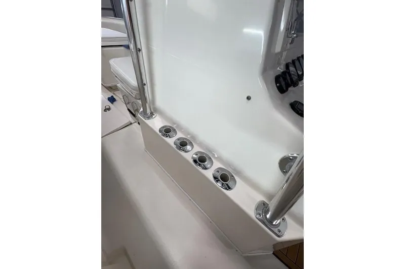 Slide: The Image of 2003 Contender 27 Open boat with dual Yamaha 225 engines on a trailer. - 8