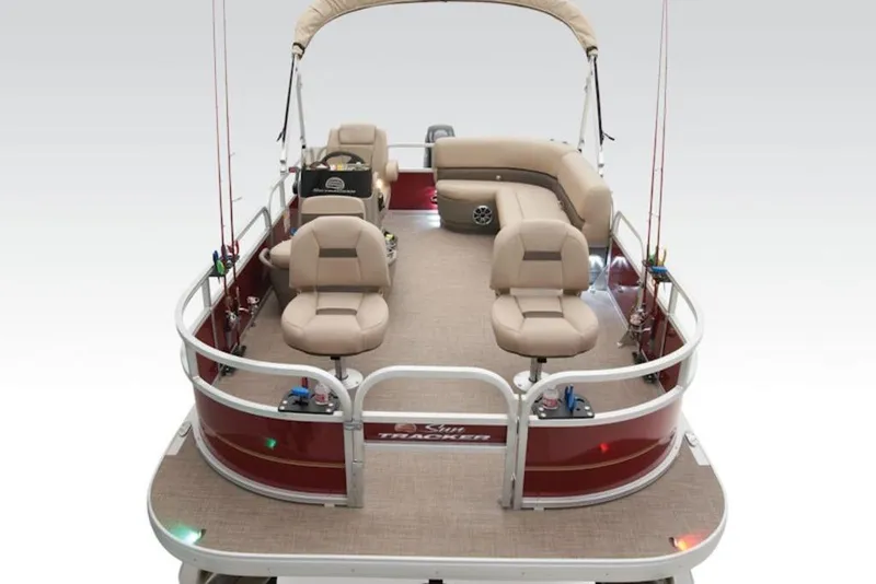 Slide: The Image of 2024 Sun Tracker Bass Buggy® 16 XL Select pontoon boat with beige seating and fishing rods. - 4
