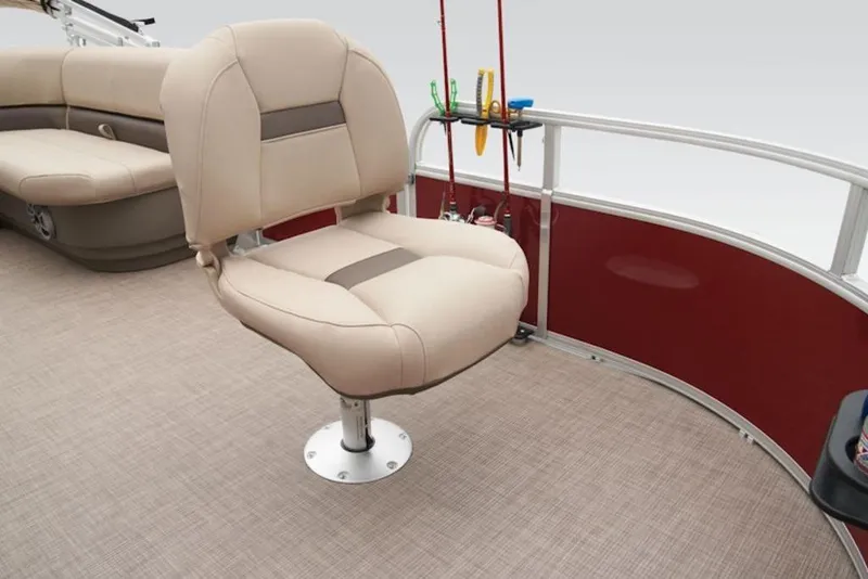 Slide: The Image of 2024 Sun Tracker Bass Buggy® 16 XL Select pontoon boat interior with beige seating. - 9