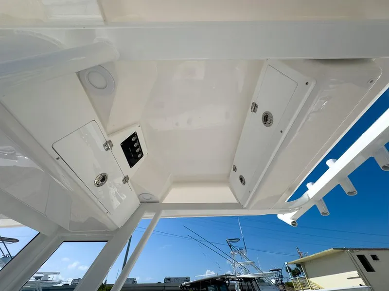 Slide: The Image of 2025 Sea Fox 228 Commander boat interior ceiling with storage compartments. - 15