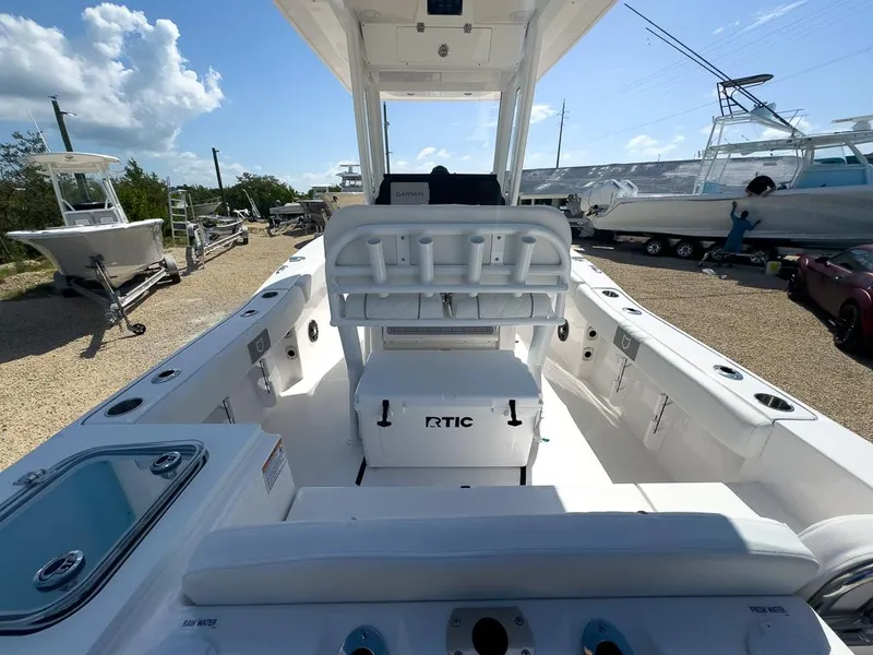 Slide: The Image of 2025 Sea Fox 228 Commander boat interior with RTIC cooler and rod holders. - 7