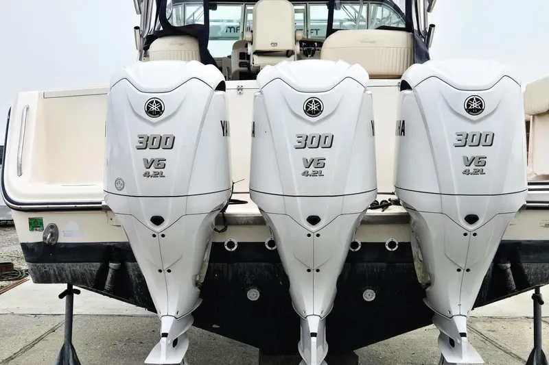Slide: The Image of 2007 Grady-White Express 360 with triple Yamaha 300 V6 outboard engines. - 4