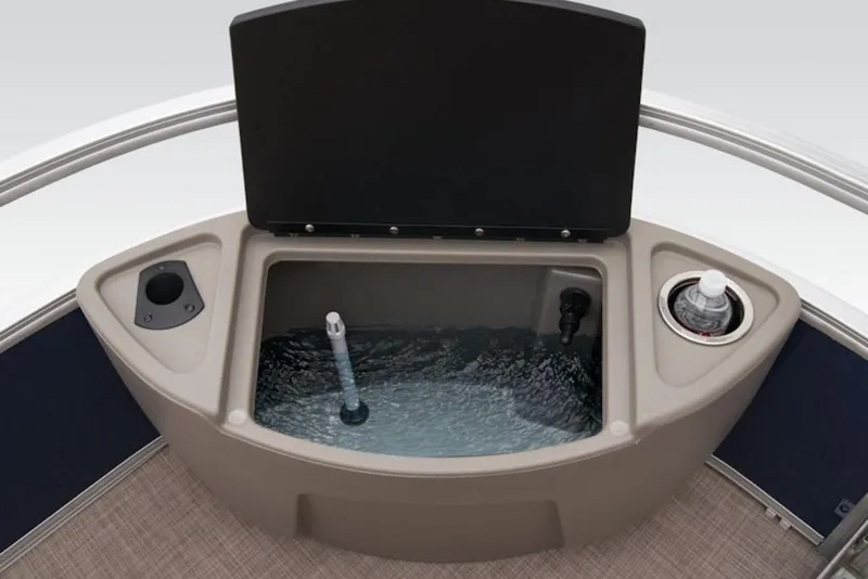 Slide: The Image of Livewell on 2025 Sun Tracker BASS BUGGY® 18 DLX pontoon boat, featuring cup holders. - 11