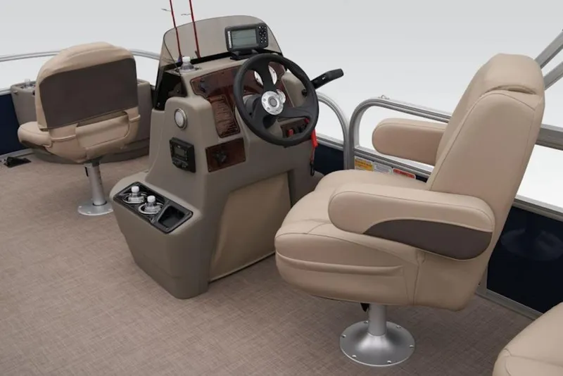 Slide: The Image of 2025 Sun Tracker BASS BUGGY® 18 DLX interior with beige seating and steering console. - 12
