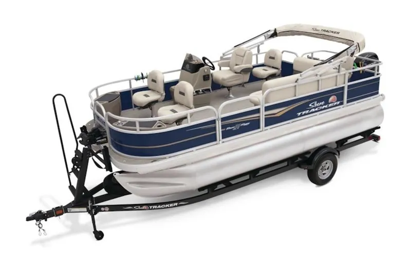 Slide: The Image of 2025 Sun Tracker BASS BUGGY® 18 DLX pontoon boat on trailer, side view. - 9