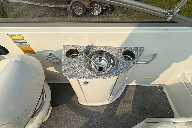 Slide: The Image of 2007 Formula 240 BR boat interior with sink and seating area. - 5