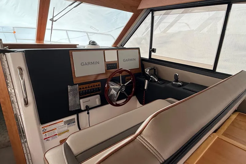 Slide: The Image of Interior of 2025 Cutwater C-32 CB boat with Garmin navigation system. - 16
