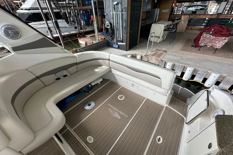 Slide: The Image of 2010 Chaparral Signature 370 boat interior with seating and dock view. - 17
