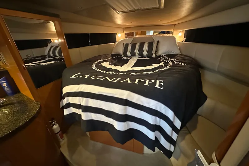 Slide: The Image of Luxurious cabin interior of 2010 Chaparral Signature 370 yacht with cozy bedding. - 40