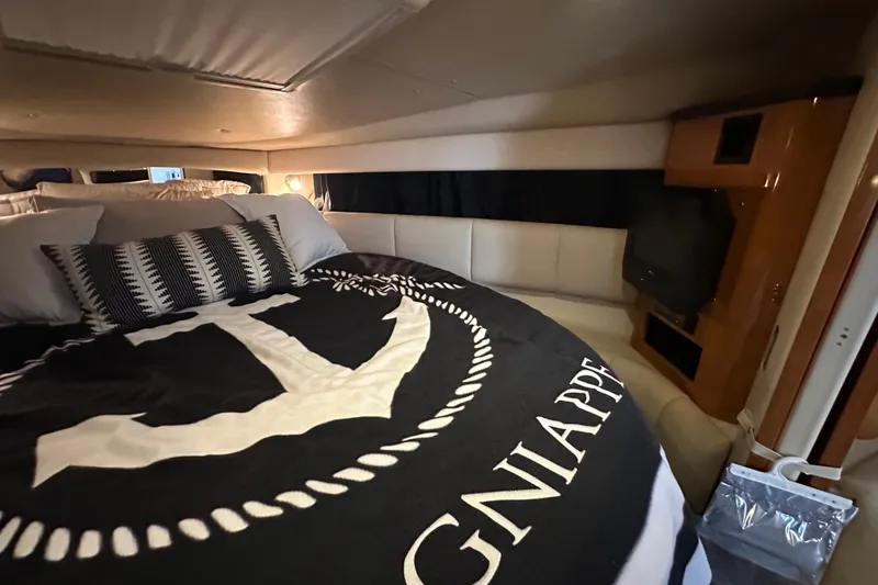 Slide: The Image of Interior of 2010 Chaparral Signature 370 yacht with cozy bedding and stylish decor. - 43