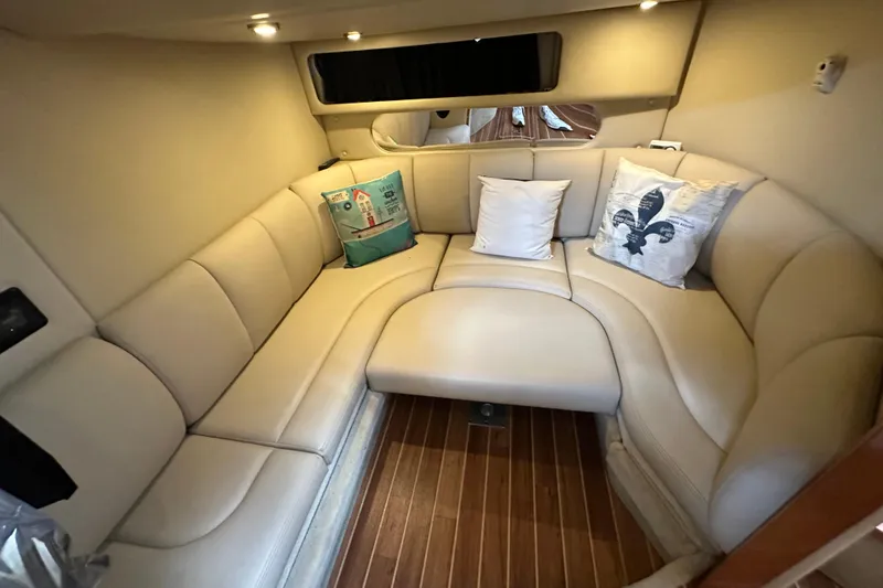 Slide: The Image of Luxurious interior of 2010 Chaparral Signature 370 yacht with plush seating and decorative pillows. - 44