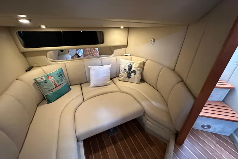 Slide: The Image of Luxurious interior of 2010 Chaparral Signature 370 yacht with cozy seating and decorative pillows. - 46