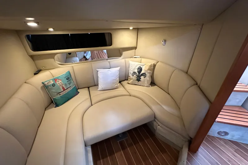 Slide: The Image of Luxurious interior of 2010 Chaparral Signature 370 yacht with plush seating and decorative pillows. - 47