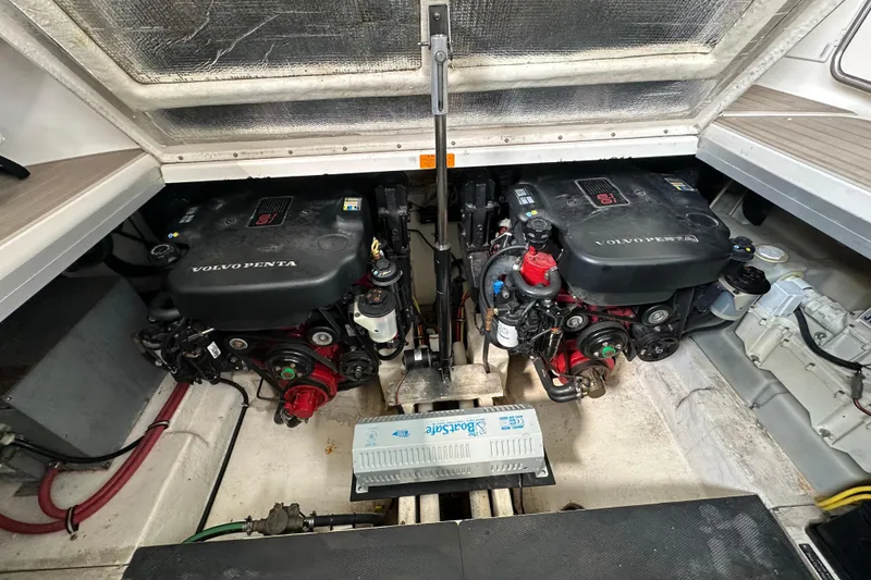 Slide: The Image of Engine compartment of 2010 Chaparral Signature 370 with dual Volvo Penta engines. - 58