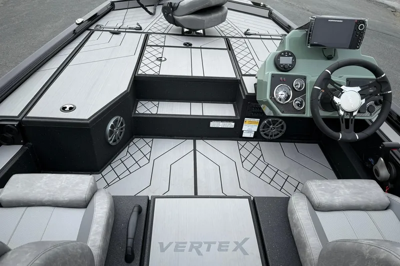 Slide: The Image of 2025 Avid 18 Vertex boat interior with modern dashboard and seating. - 11