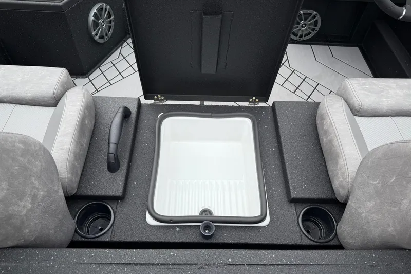 Slide: The Image of Interior of 2025 Avid 18 Vertex boat with seating and storage compartment. - 12