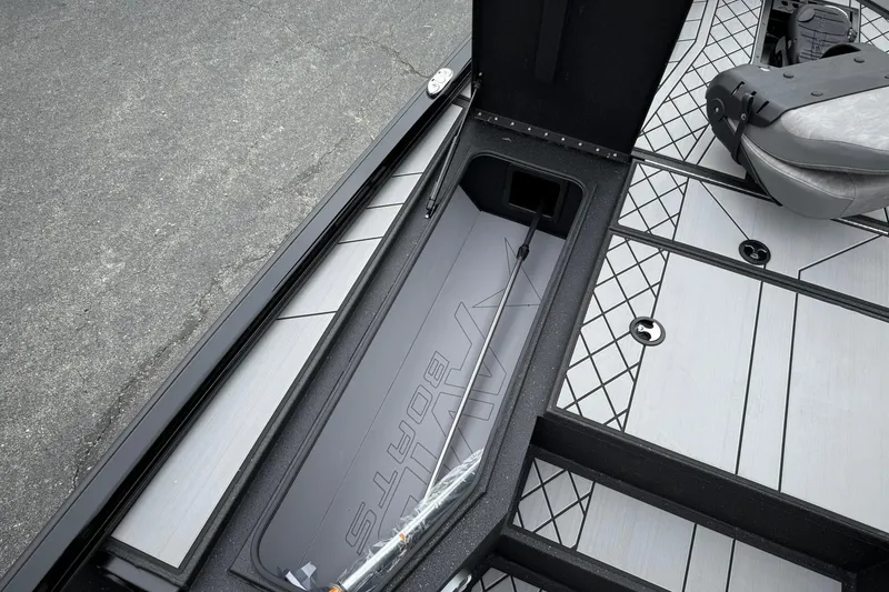 Slide: The Image of 2025 Avid 18 Vertex boat interior with storage compartment and seating. - 14