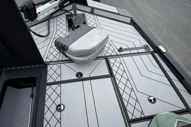 Slide: The Image of 2025 Avid 18 Vertex boat deck with modern design and storage compartments. - 15