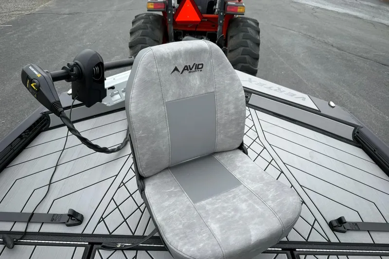 Slide: The Image of 2026 Avid 18 Vertex boat seat with steering controls, featuring modern design and comfort. - 18