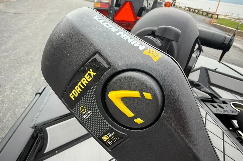Slide: The Image of Minn Kota Fortrex motor on Avid 18 Vertex boat, 2025 model, close-up view. - 19