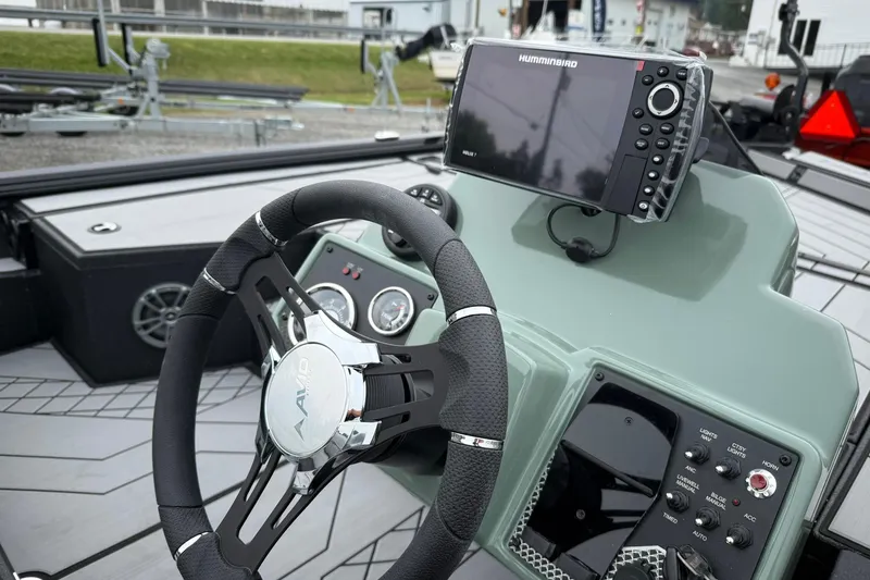 Slide: The Image of Steering console of 2025 Avid 18 Vertex boat with Humminbird electronics. - 8