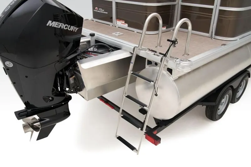 Slide: The Image of 2025 Sun Tracker Sportfish™ 24 XP3 pontoon boat with Mercury outboard motor and ladder. - 7