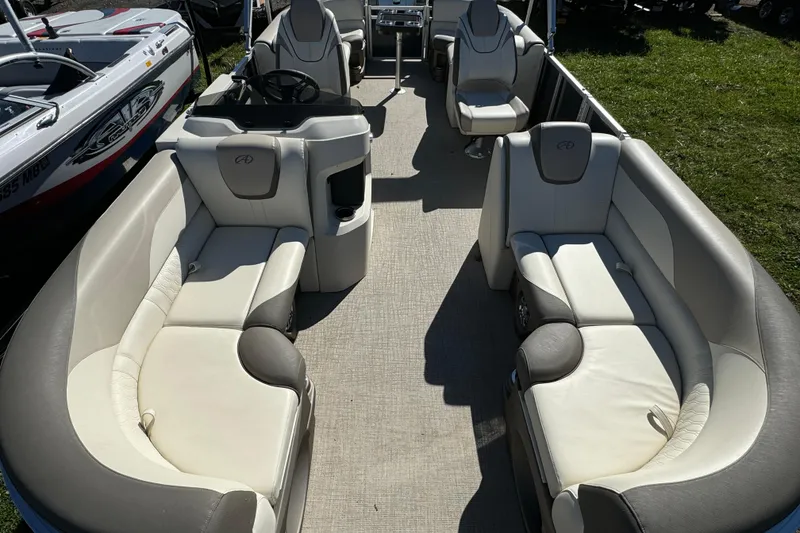 Slide: The Image of 2022 Avalon LSZ Quad Lounger 2385 pontoon boat interior with plush seating. - 3