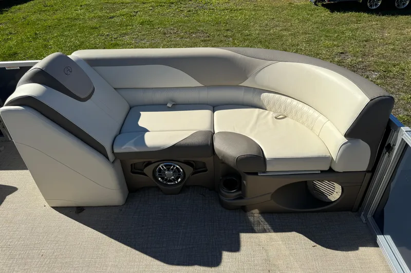 Slide: The Image of Luxurious seating on 2022 Avalon LSZ Quad Lounger 2385 pontoon boat, featuring plush upholstery. - 5