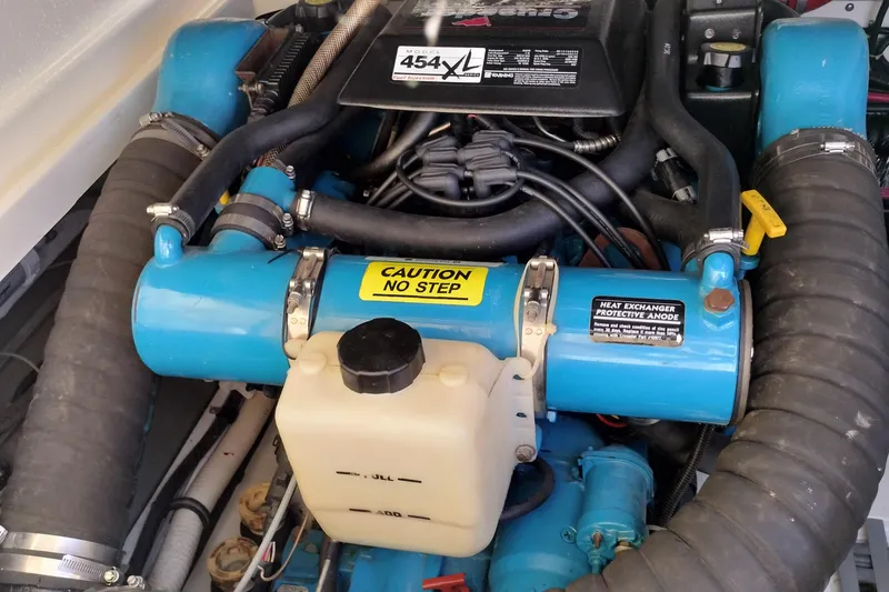 Slide: The Image of Engine compartment of a 1995 Tiara Yachts 2900 Open, featuring a 454XL engine. - 21