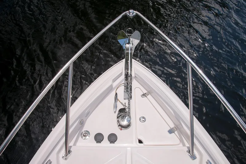 Slide: The Image of Manufacturer Provided Image: Bow of 2022 Regal 28 Express boat with anchor and railing. - 12