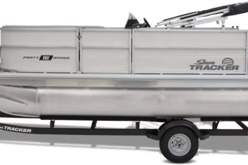 Slide: The Image of 2026 Sun Tracker Party Barge 16 DLX pontoon boat on trailer, side view. - 4