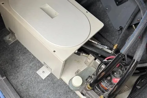 Slide: The Image of 2024 Yamaha Boats 222XD engine compartment with visible components and wiring. - 10