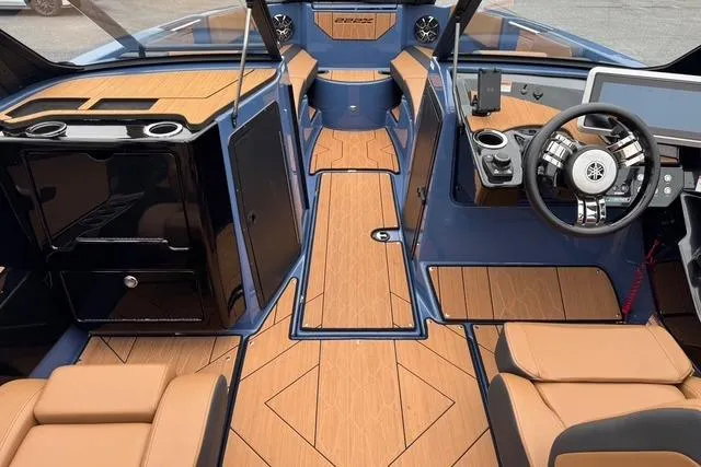 Slide: The Image of 2024 Yamaha Boats 222XD interior with sleek design, modern dashboard, and luxurious seating. - 8