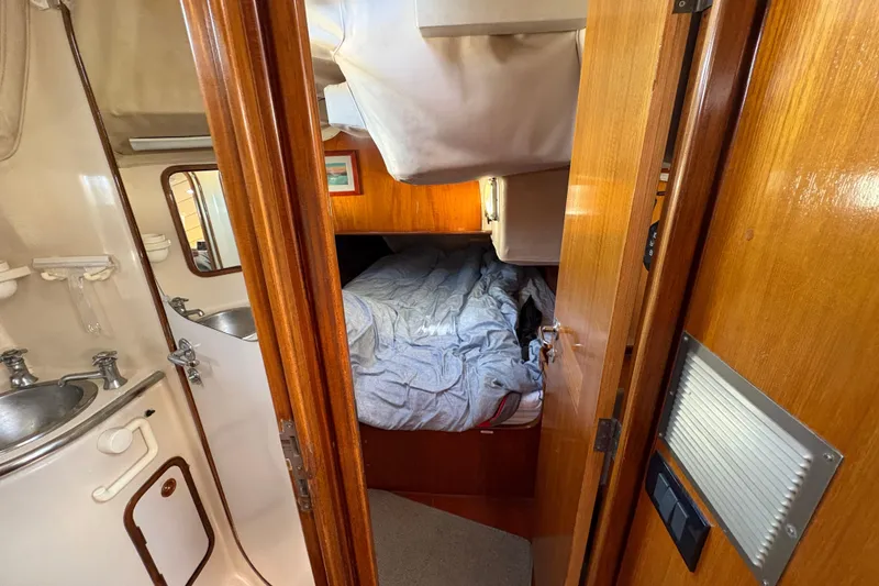 Slide: The Image of Interior of 1990 Beneteau Oceanis 500 yacht showing cabin and bathroom. - 82