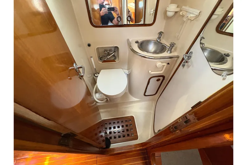 Slide: The Image of Bathroom interior of 1990 Beneteau Oceanis 500 yacht with sink and toilet. - 85