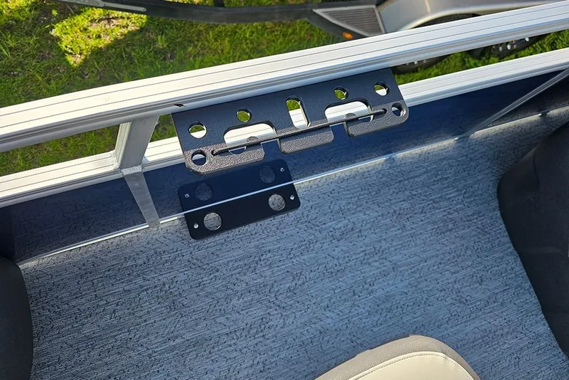 Slide: The Image of 2026 Sun Tracker Bass Buggy 18 DLX interior with mounted accessory bracket. - 23