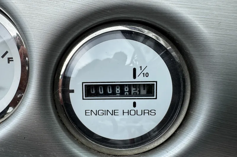 Slide: The Image of Close-up of 2004 Tigé 22V Riders Edition engine hour meter displaying 88.2 hours. - 9