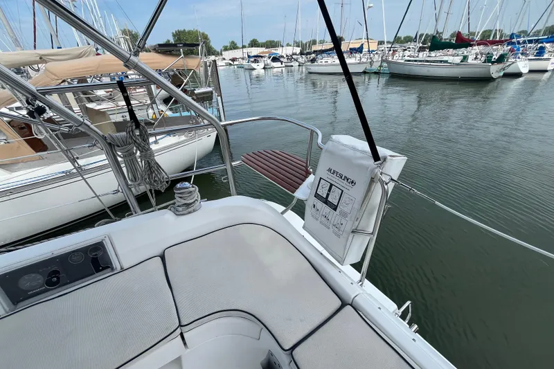 Slide: The Image of 2006 Hunter 36-2 sailboat cockpit view in marina with Lifesling safety equipment. - 11