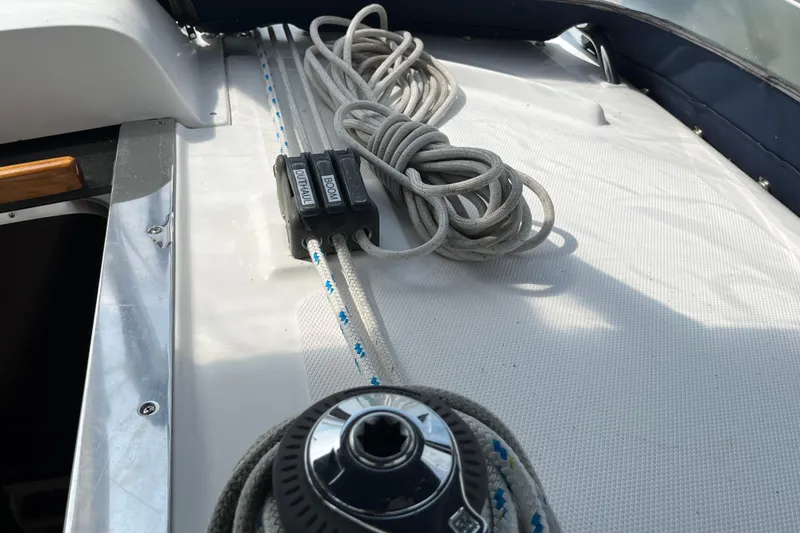 Slide: The Image of Deck of 2006 Hunter 36-2 sailboat with ropes and winch system. - 7