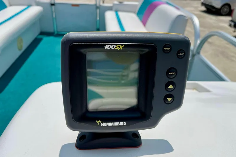 Slide: The Image of Humminbird 100SX fish finder on 1998 Sundancer Pontoons 240 boat interior. - 8