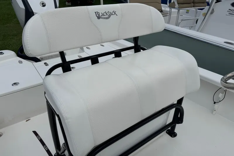 Slide: The Image of White seating on 2015 BlackJack 224 Bay boat, featuring sleek design and comfort. - 10