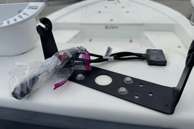 Slide: The Image of 2015 BlackJack 224 Bay boat deck with mounting hardware and wiring components. - 12