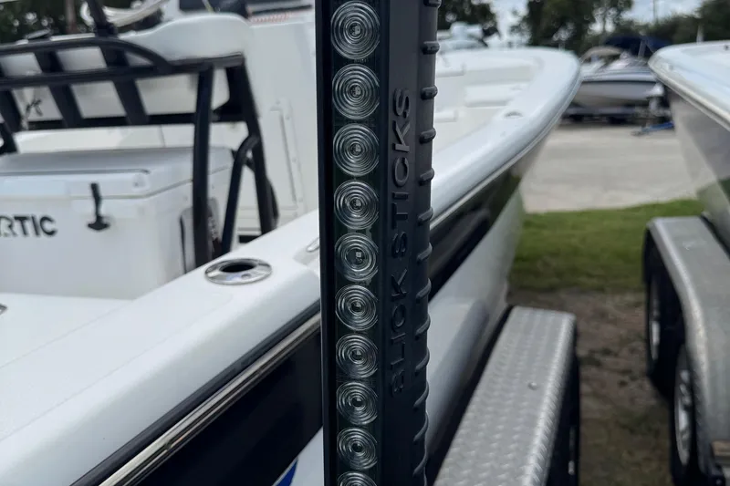 Slide: The Image of 2015 BlackJack 224 Bay boat with Slick Sticks accessory on trailer. - 6