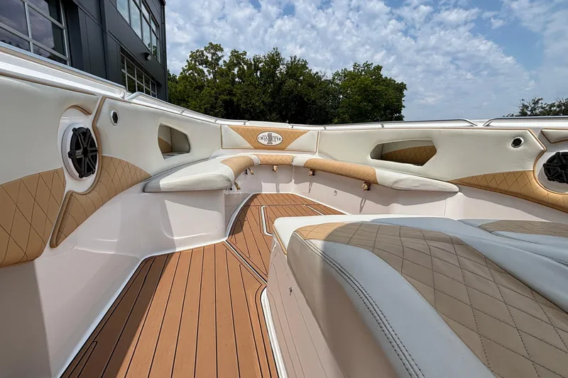 Slide: The Image of Luxurious interior of 2014 Cigarette 39 GTS boat with tan and white seating. - 29