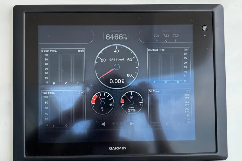 Slide: The Image of Garmin display showing gauges for Cigarette 39 GTS, 2014 model, including speed, pressure, and temperature. - 51