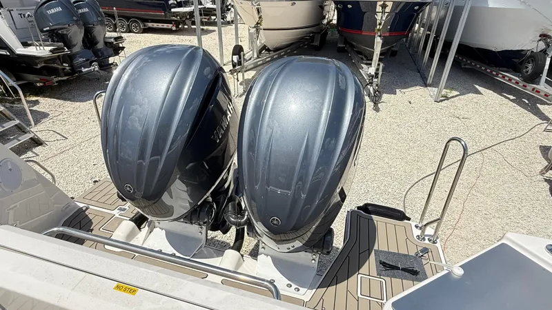 Slide: The Image of 2026 Cutwater C-288 Coupe with dual Yamaha outboard engines, displayed on a gravel lot. - 15