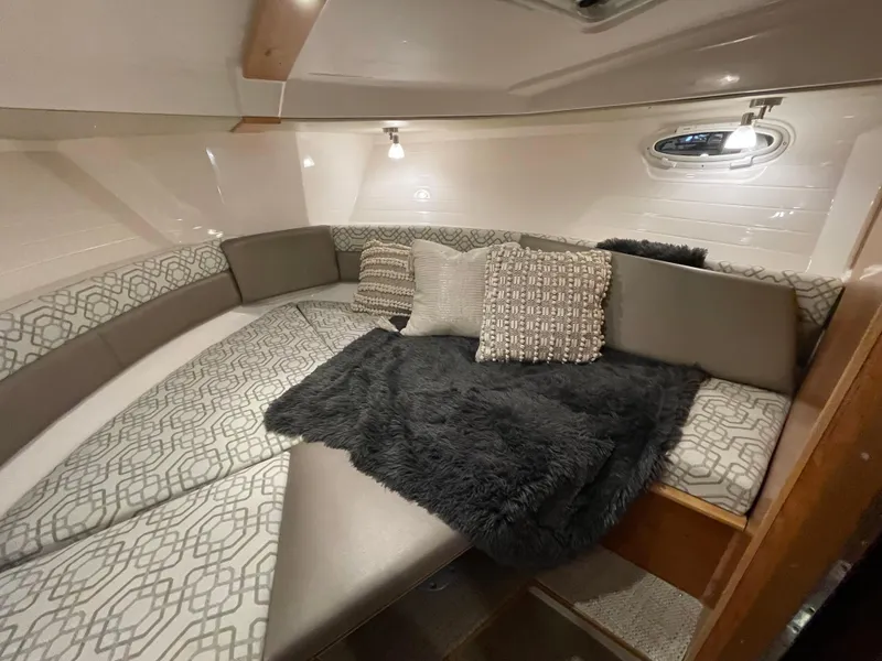 Slide: The Image of Luxurious interior of 2026 Cutwater C-288 Coupe with cozy bedding and stylish decor. - 33