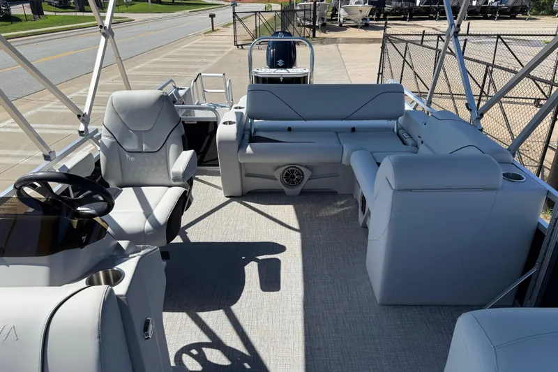 Slide: The Image of Luxurious 2026 Avalon Venture 85 Versatile pontoon boat with rear bench seating and modern design. - 12